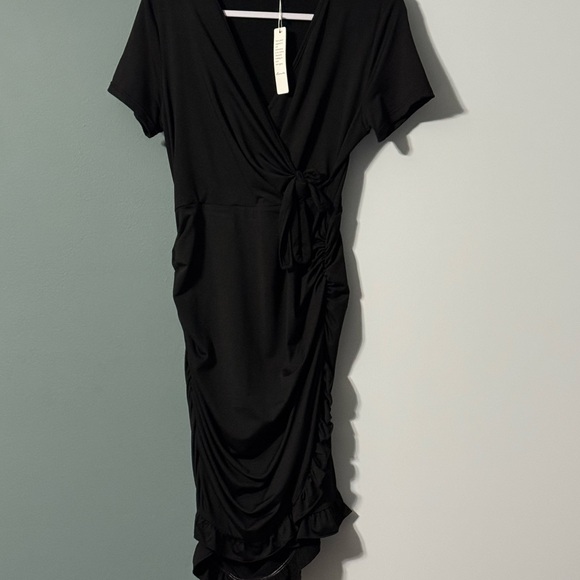 Dresses & Skirts - Classic Black Wrap-Style Women's Dress Ruching bottom side ruffle. Never worn